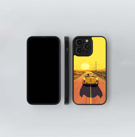 Yellow Beetle Car Driving on Desert Road at Sunset Glass Case