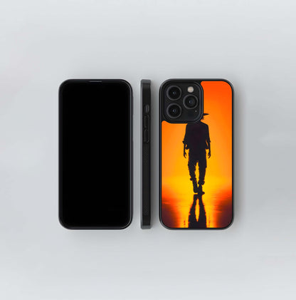 Silhouette Figure in Cowboy Hat against Orange Sunset Glass Case