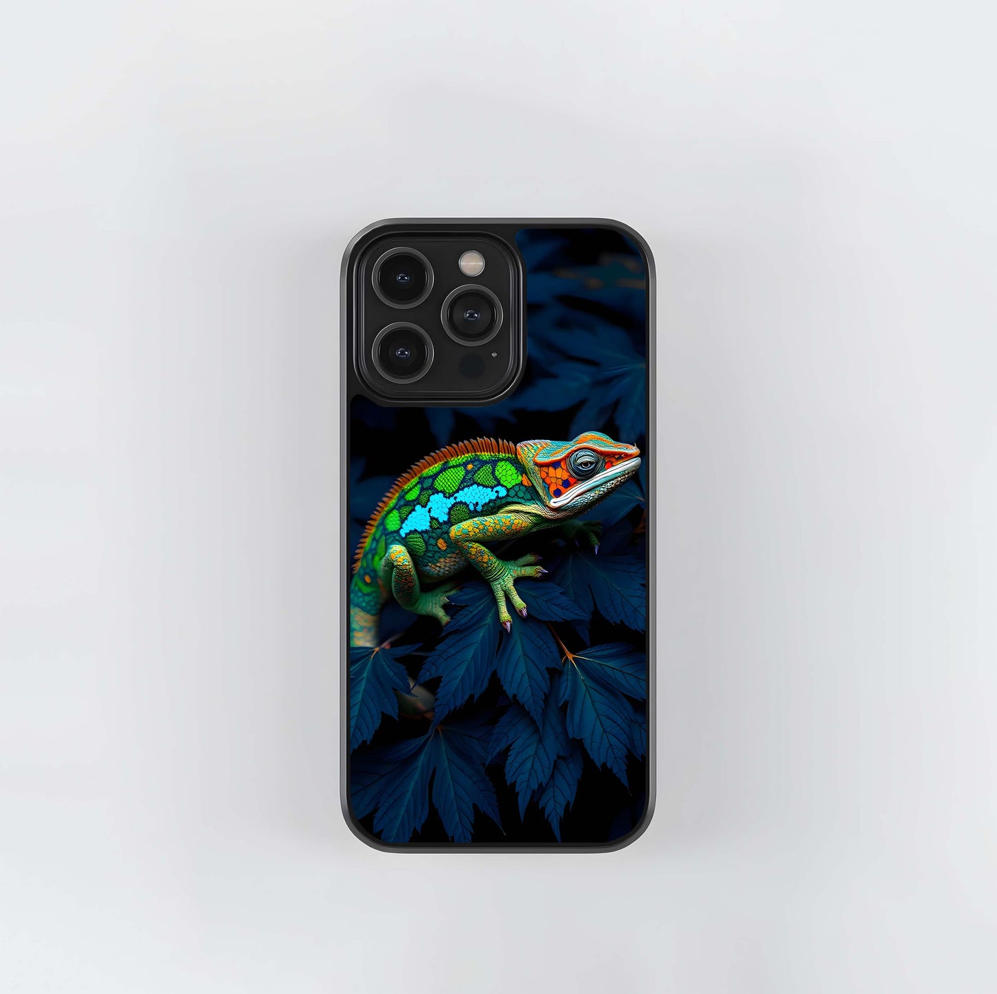 Colorful chameleon on dark leaves Glass Case