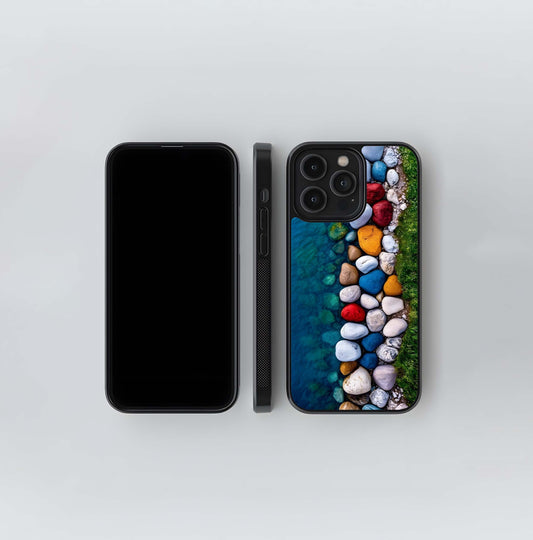Colorful river stones and grass Glass Case