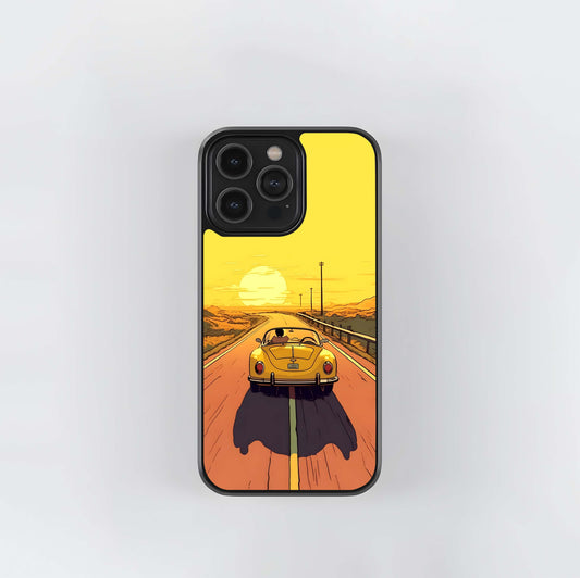 Yellow Beetle Car Driving on Desert Road at Sunset Glass Case