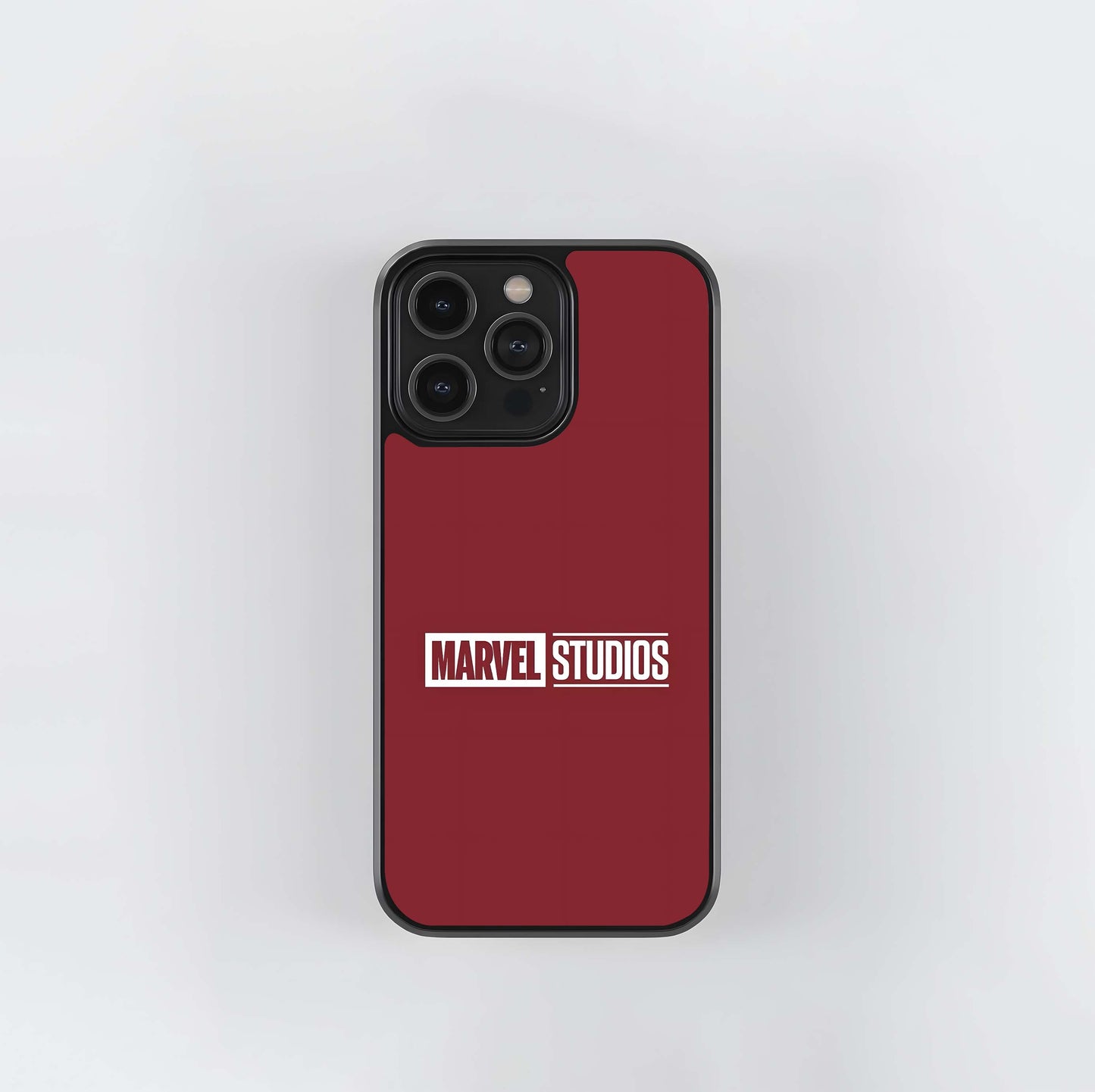 Marvel Studios Logo on Maroon Background Glass Case