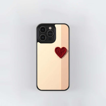 Red Sand Heart on Beige Background Glass Case