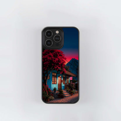 Blue house with red tree at sunset Glass Case